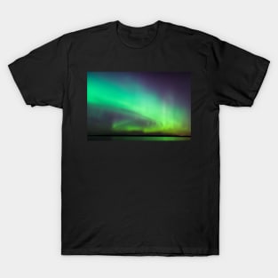 Northern lights over lake in Finland T-Shirt